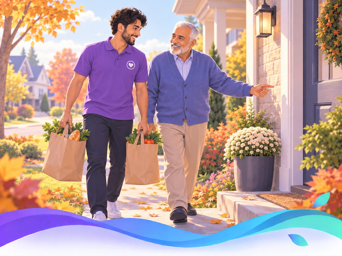 A young iCaria helper carrying groceries up the path with an older man